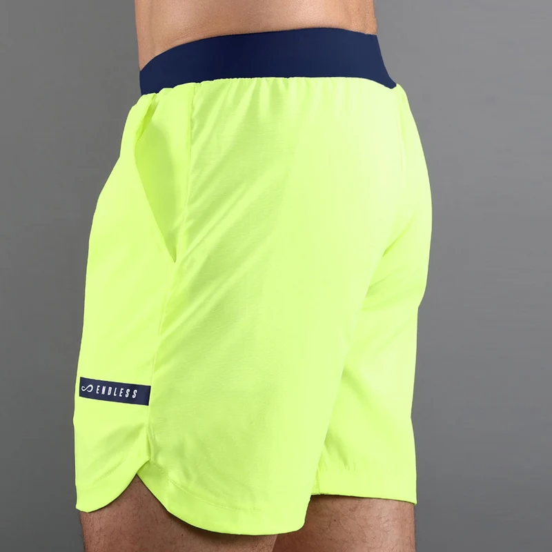 SWIFT Shorts Herren - neongelb, blau